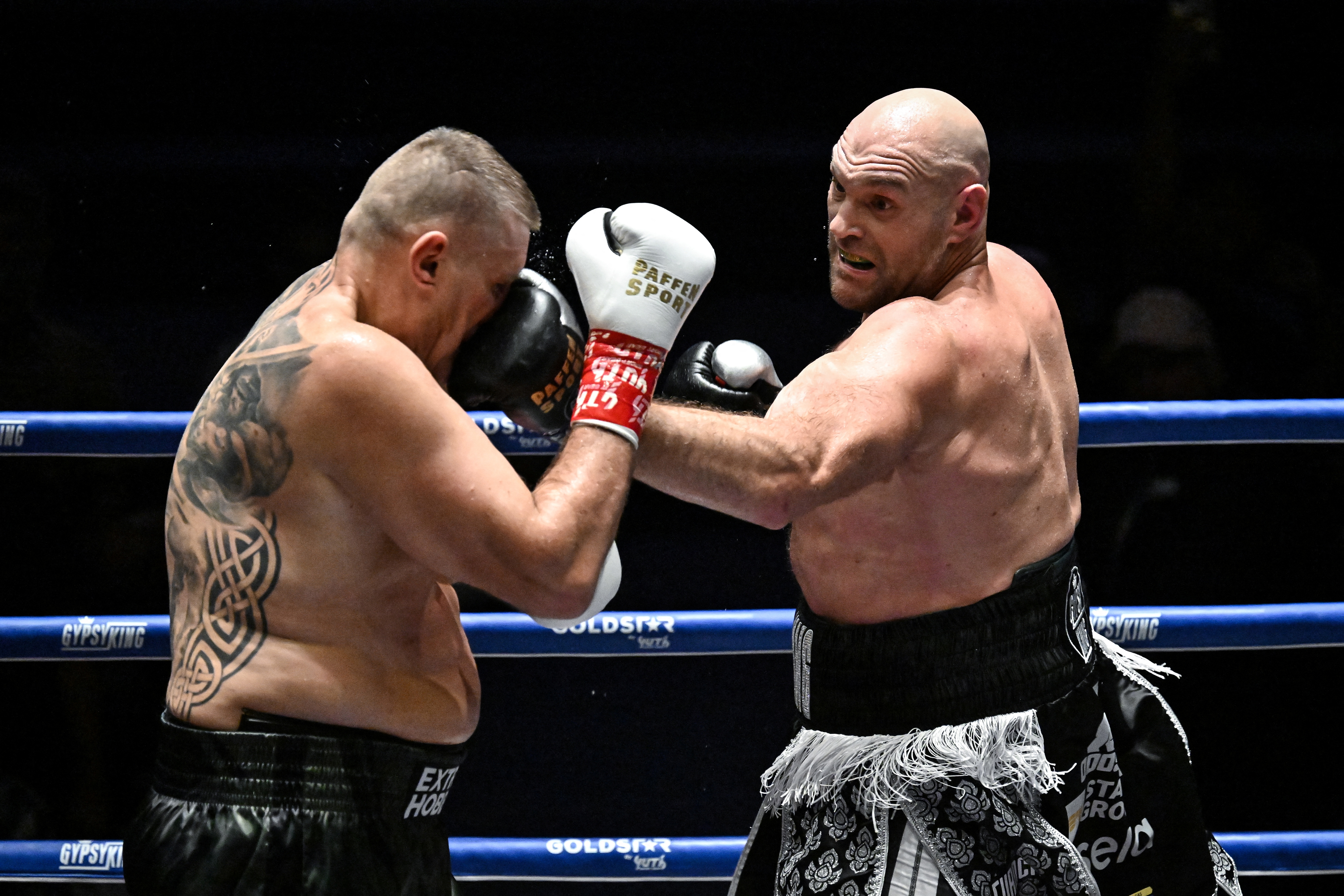 Boxen: Tyson Fury wënnt no 7 Ronnen