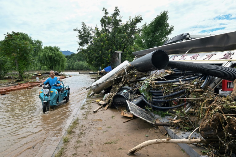 Over 80,000 evacuated: Heavy rain, landslides kill more than 30 in ...