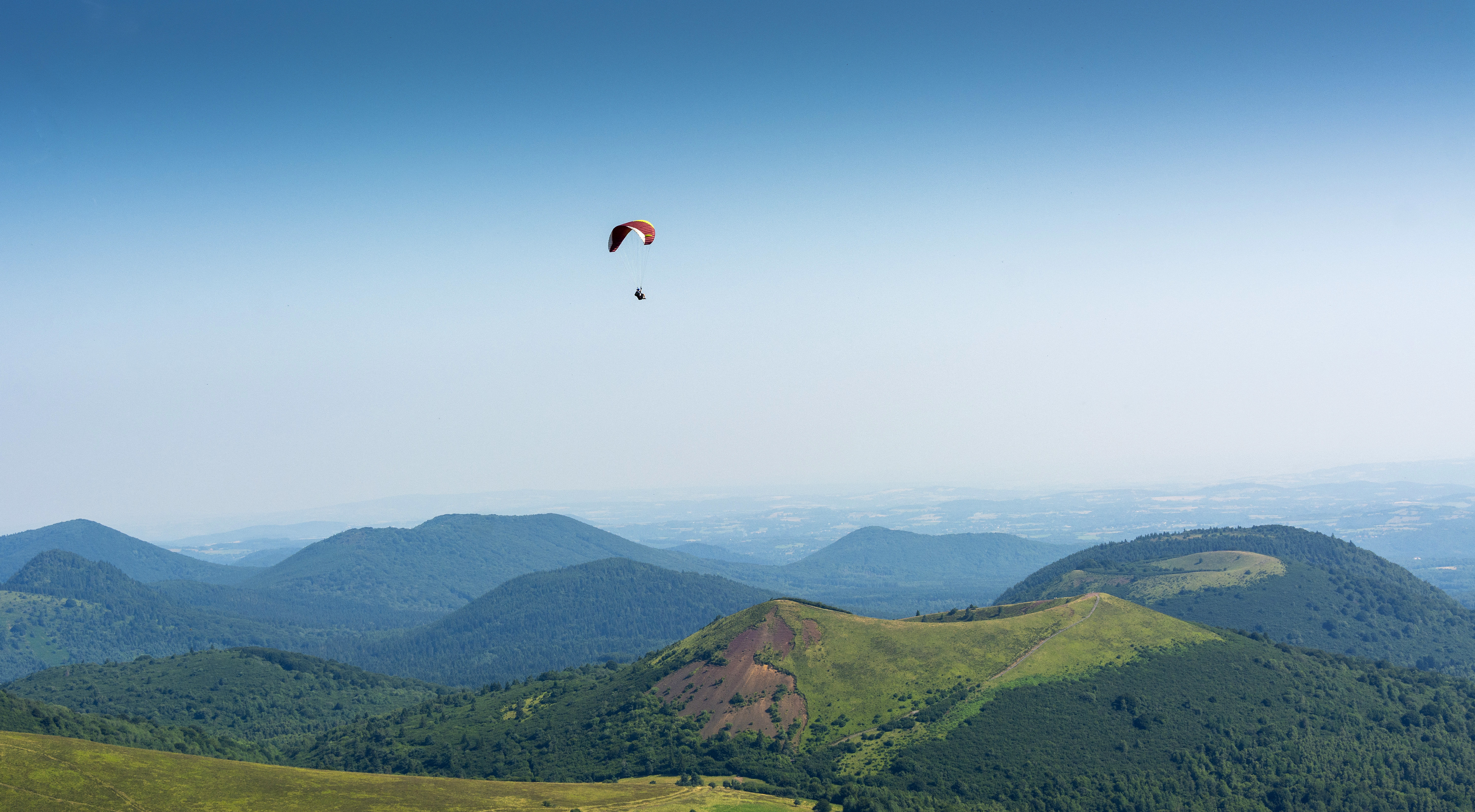 Dramatic footage: Paraglider survives collision with plane mid-air in Austria