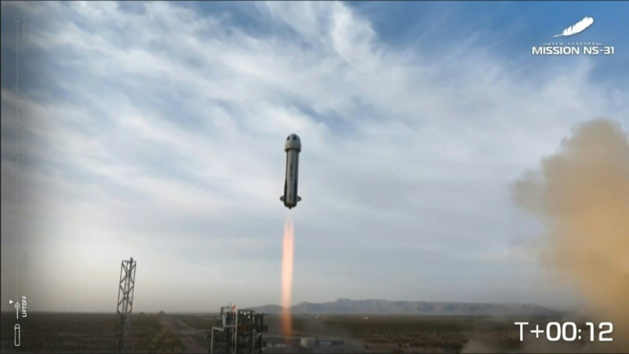A Blue Origin rocket carrying singer Katy Perry, among others, blasts off for space
