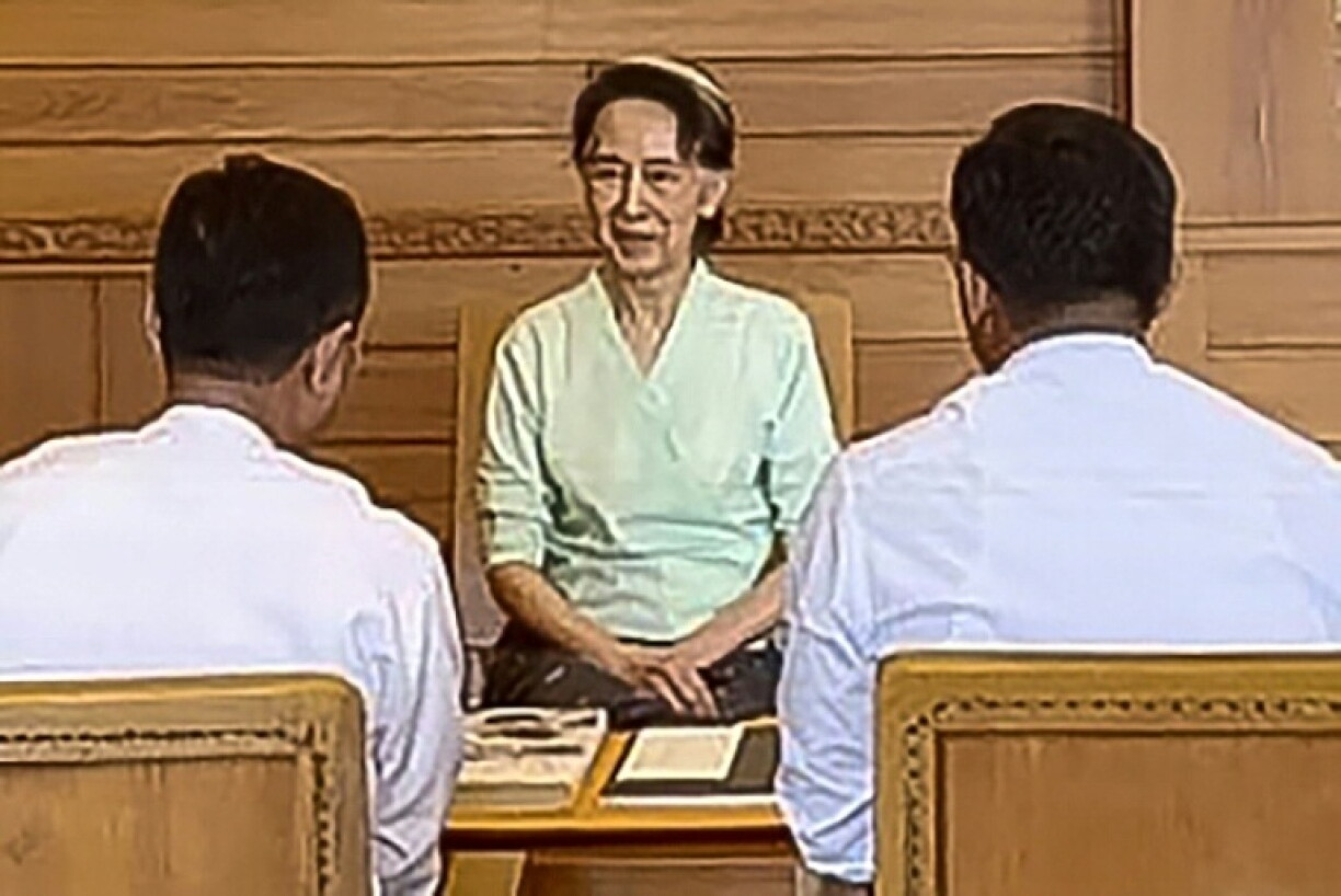 Myanmar authorities released a photograph on October 19 showing Aung San Suu Kyi meeting with government officials in Naypyidaw, where she received a package from King Charles