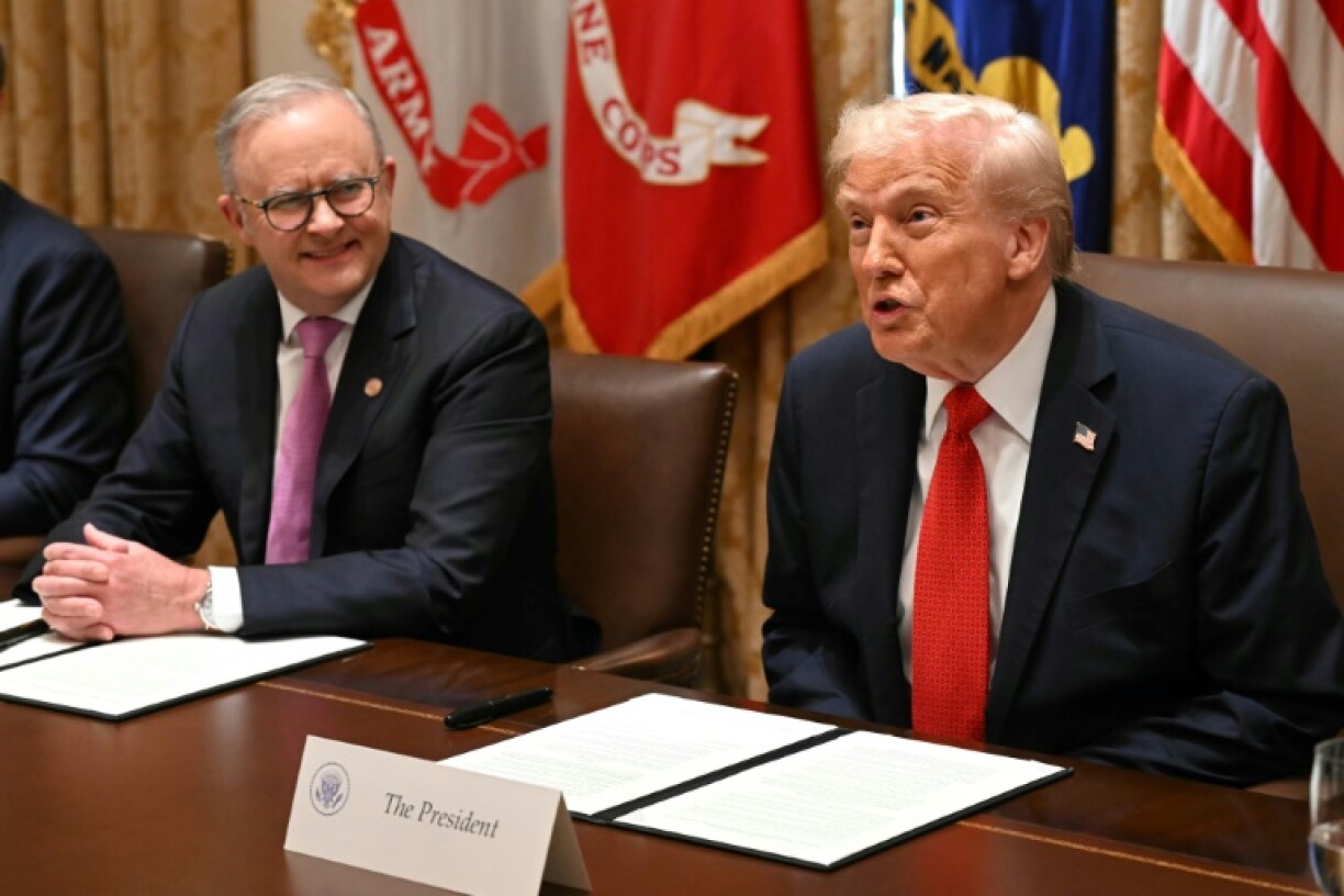 US President Donald Trump speaks as Australia's Prime Minister Anthony Albanese looks on in the Cabinet Room at the White House