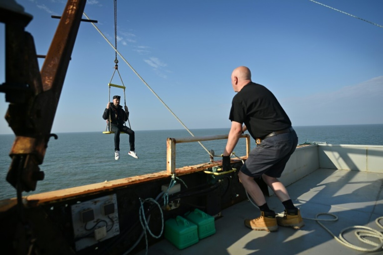 Liam Bates being hoisted onto Sealand