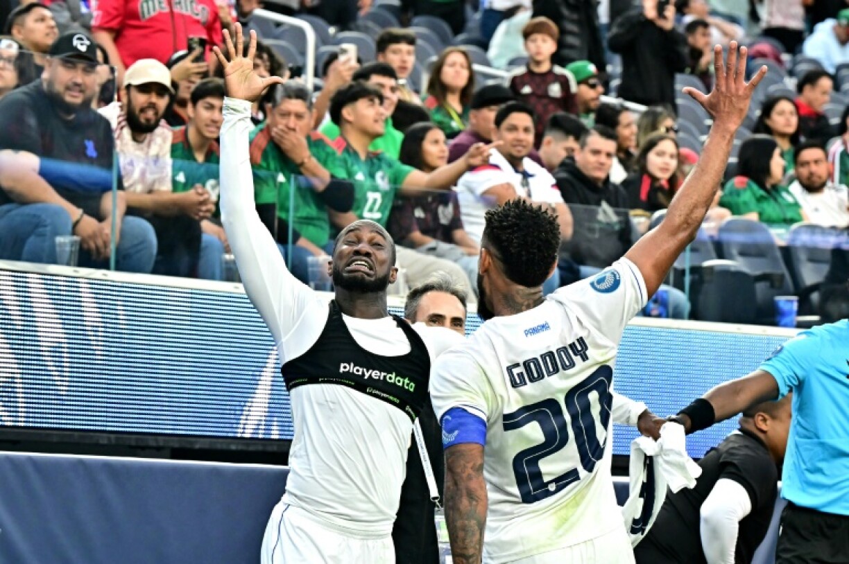 Panama's forward Cecilio Waterman (left) celebrates after scoring his team's winner in a 1-0 upset against the United States
