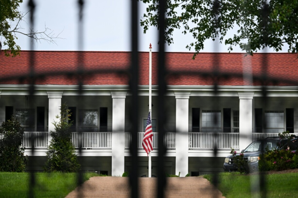 An American flag flies at half staff at Dolly Parton's house in Brentwood, Tennessee, on August 26, 2026