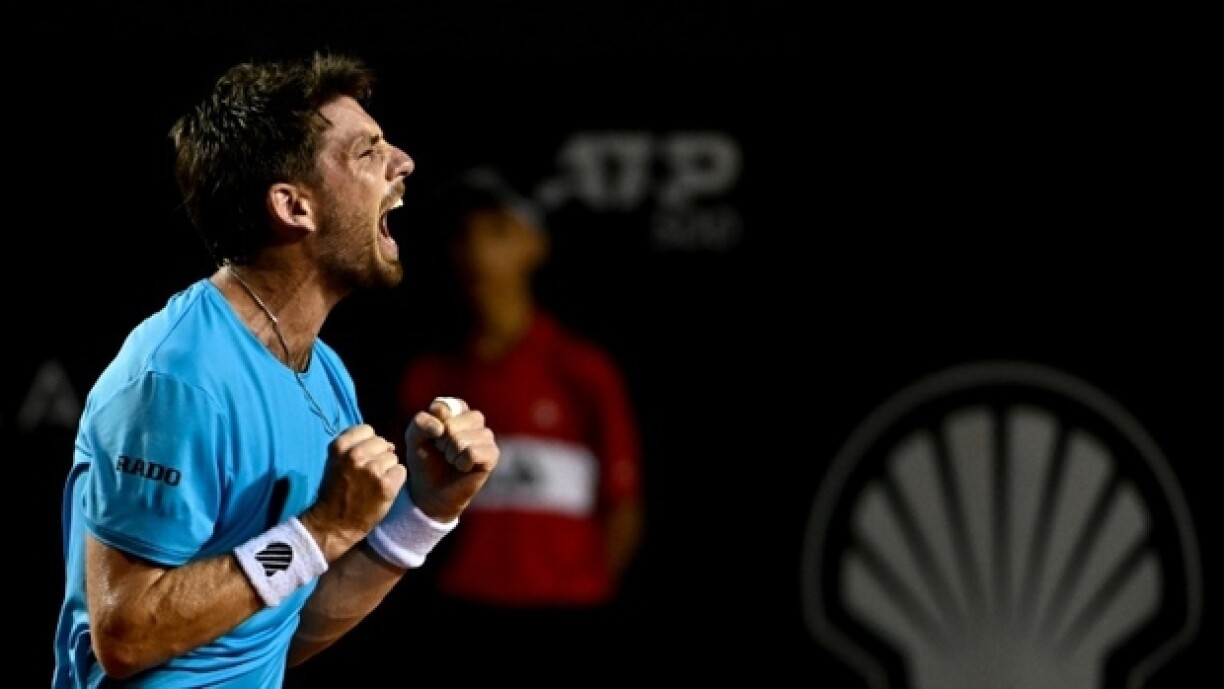Le Britannique Cameron Norrie exulte après sa victoire contre Carlos Alcaraz en finale du tournoi de tennis de Rio de Janeiro, le 26 février 2023