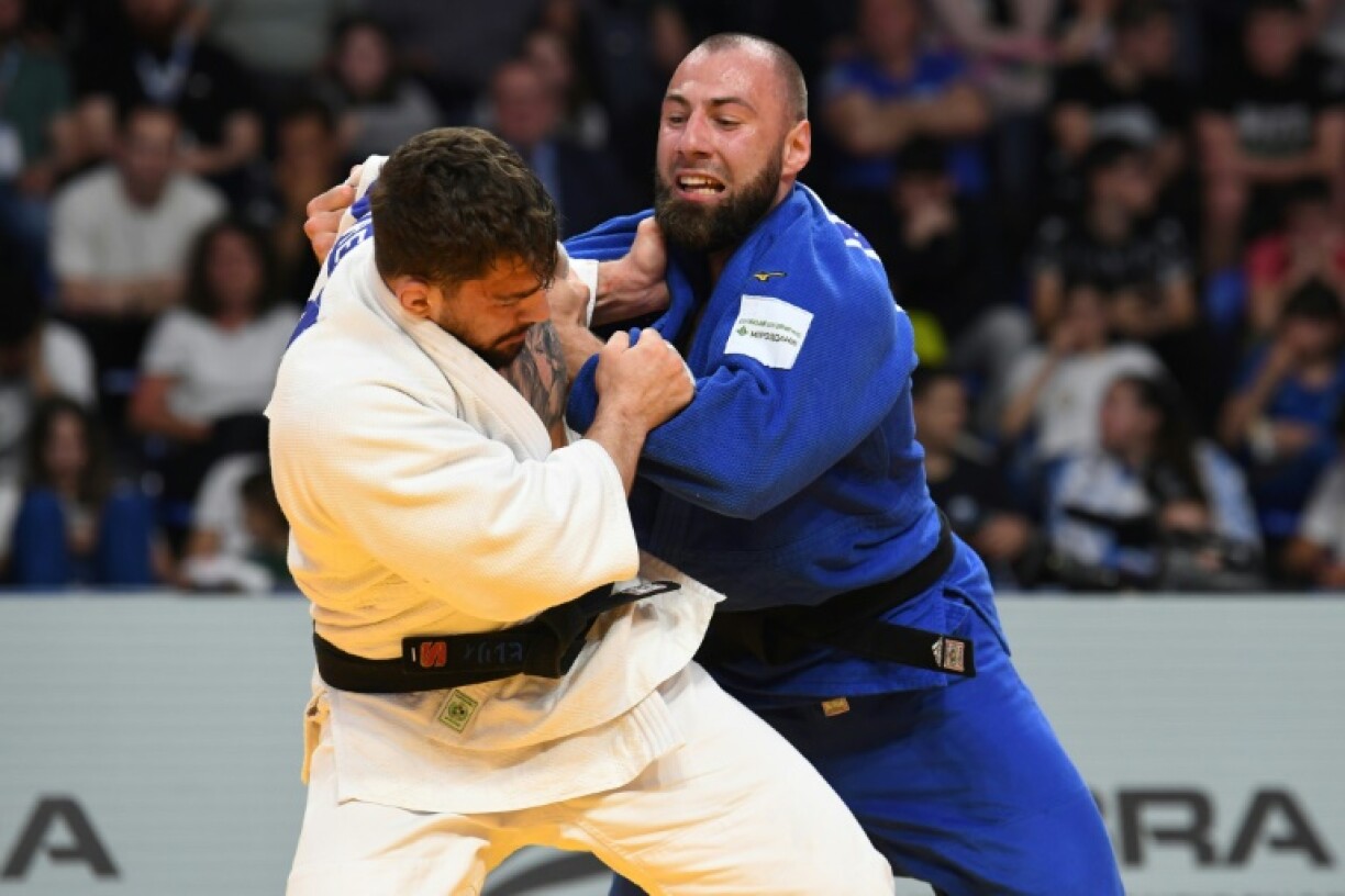 Ukraine's Anton Savytskiy (blue) in the men's -100 kg category at the European Judo Championships in Podgorica on April 26, 2025