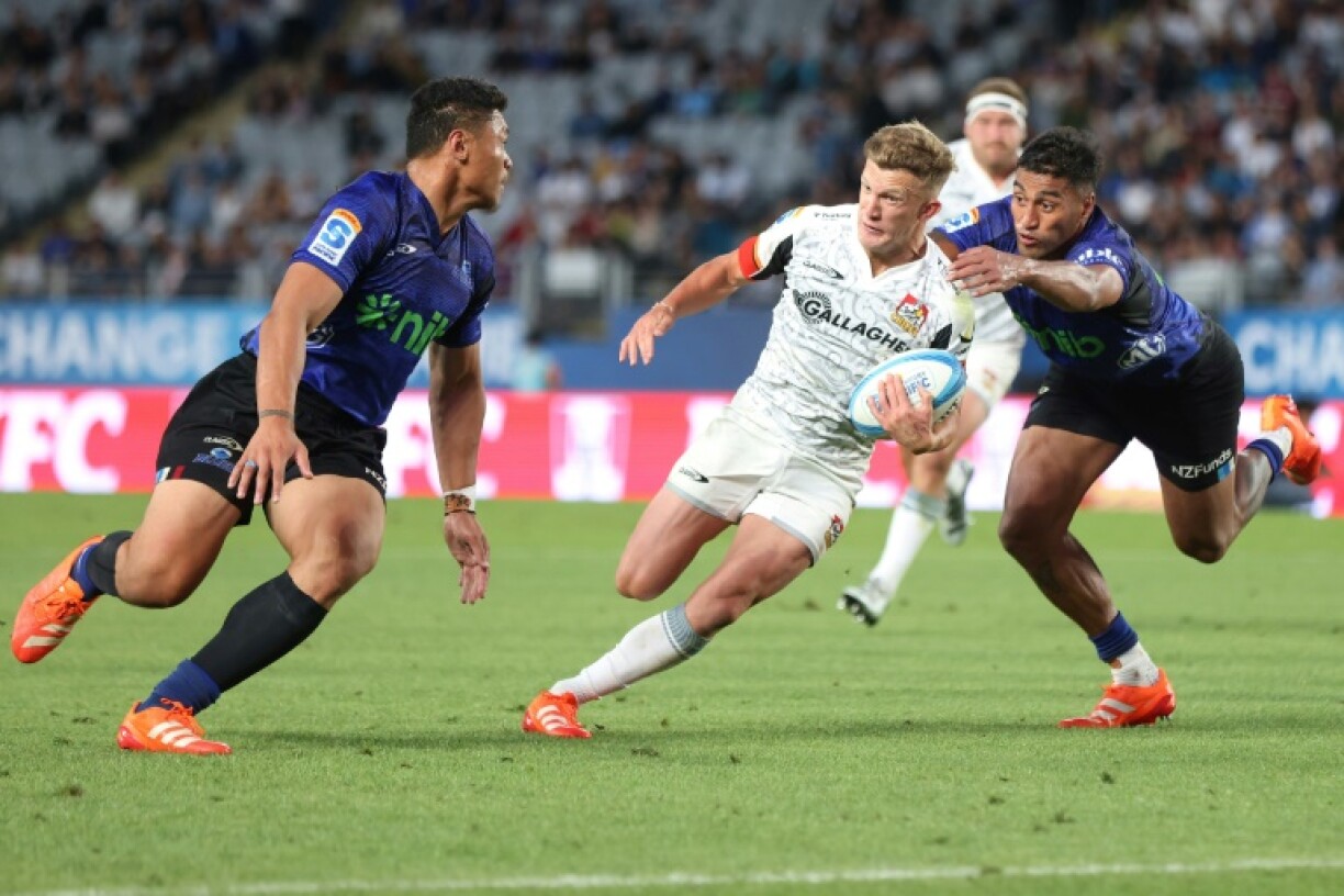 Playmaker Damian McKenzie scored two tries as the Waikato Chiefs beat the Auckland Blues 25-14 in their Super Rugby Pacific match at Eden Park in Auckland
