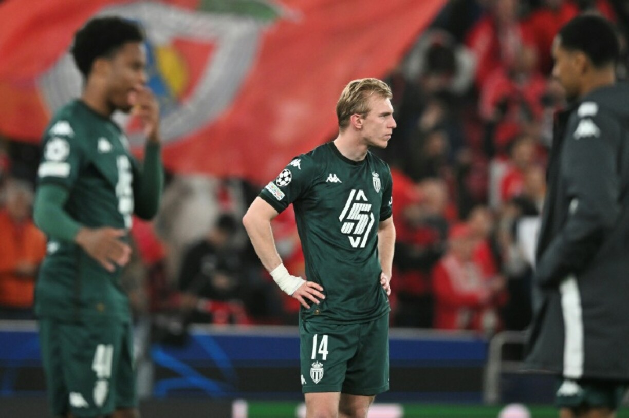 New signing Mika Biereth (c) and his Monaco teammates look on after being knocked out of the Champions League by Benfica on Tuesday