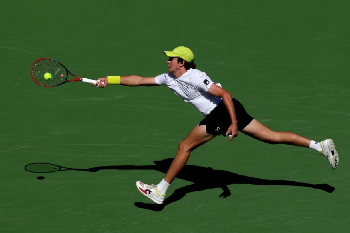 Full stretch: Brazilian Joao Fonseca on the way to victory over Britain's Jacob Fearnley in the first round at Indian Wells
