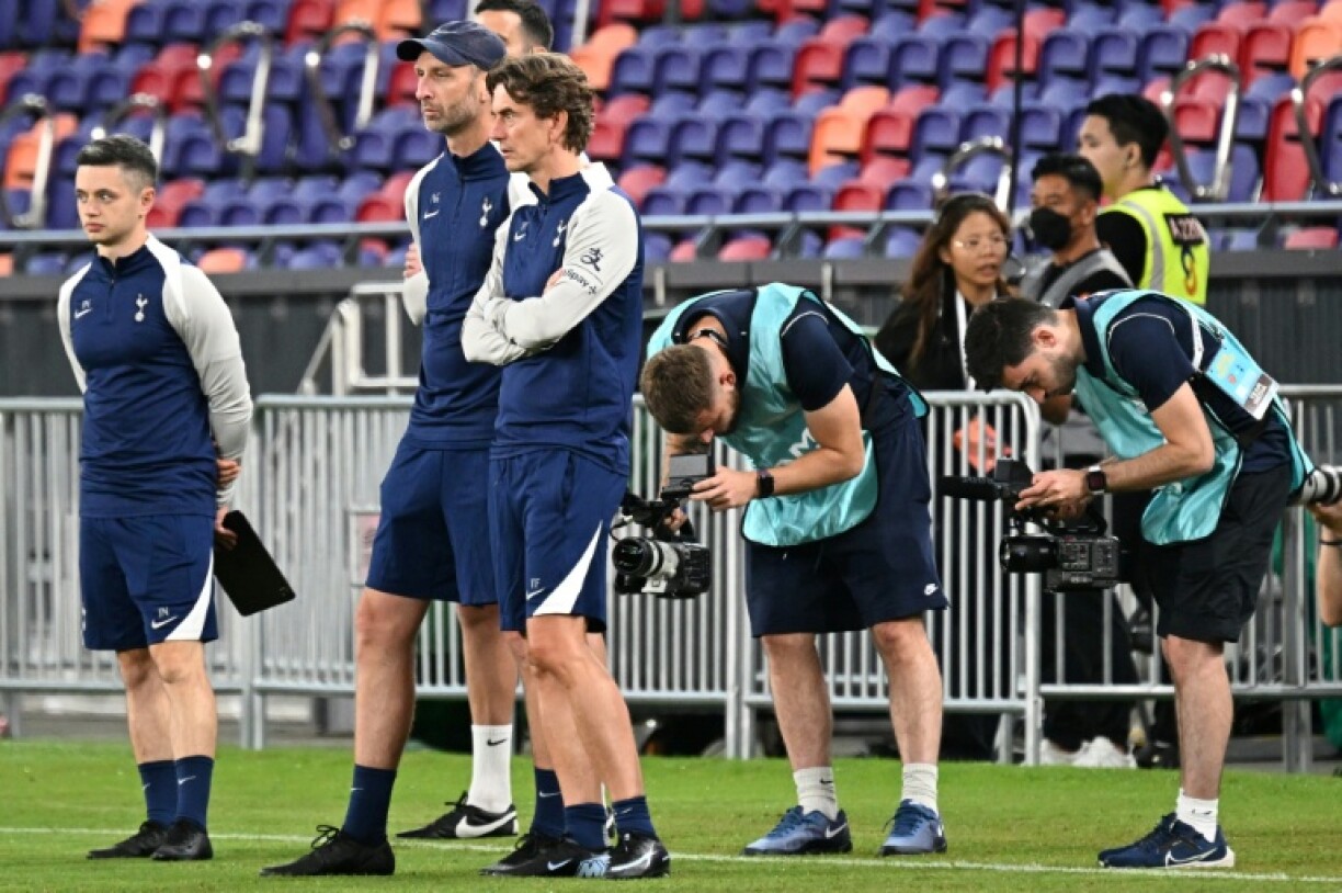 Tottenham Hotspur head coach Thomas Frank (centre) watches his team train at the Kai Tak Stadium in Hong Kong on Tuesday ahead of a friendly against Arsenal