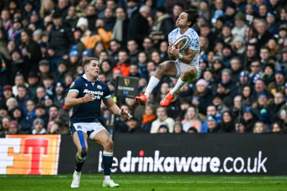 Italy's talented backs like Ange Capuozzo (R) failed to sparkle which is a cause for concern for coach Gonzalo Quesda