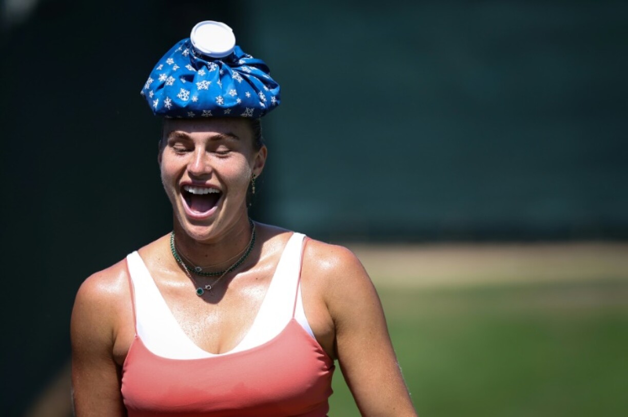 World number one Aryna Sabalenka with an ice pack on her head during a training session at Wimbledon