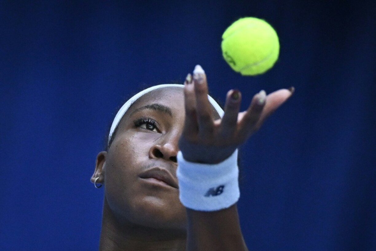 Coco Gauff serves against Leylah Fernandez in Beijing