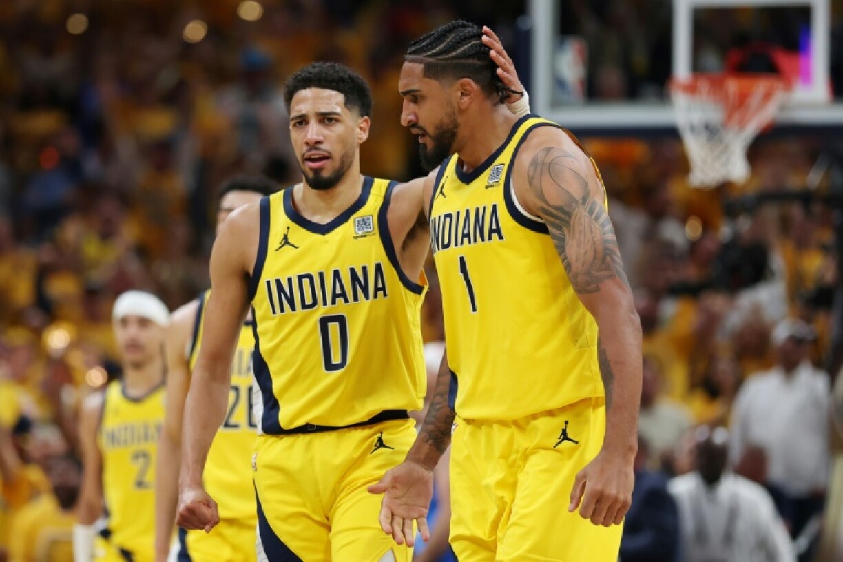 Tyrese Haliburton and Obi Toppin of the Indiana Pacers share a moment during game four of the NBA Finals