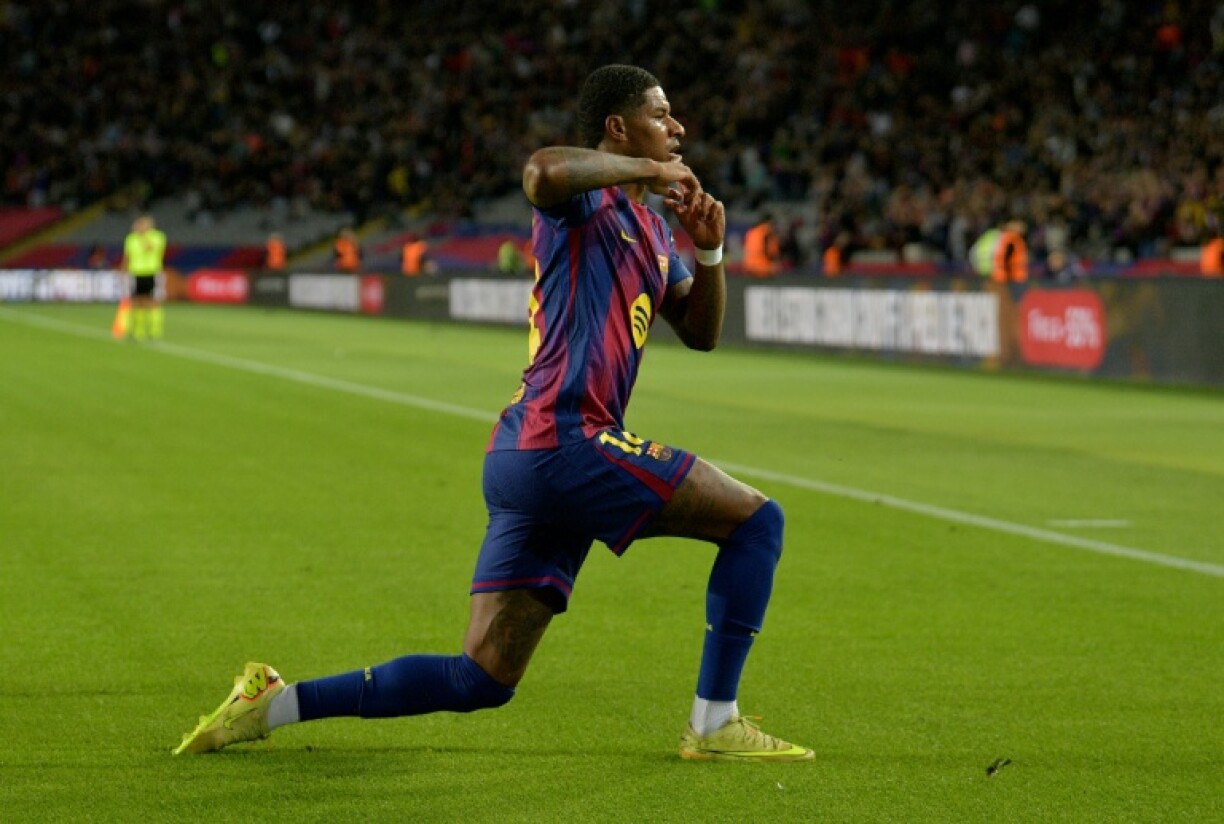 Barcelona forward Marcus Rashford celebrates scoring his team's third goal in the win over Elche on Sunday in La Liga