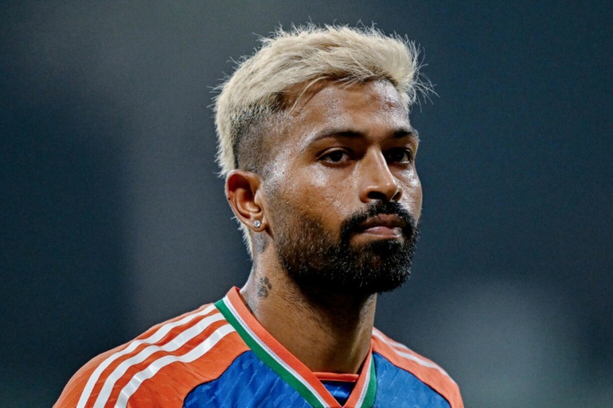 India's Hardik Pandya broke the Omani second wicket stand with a stunning outfield catch to dismiss Aamir Kaleem off Harshit Rana