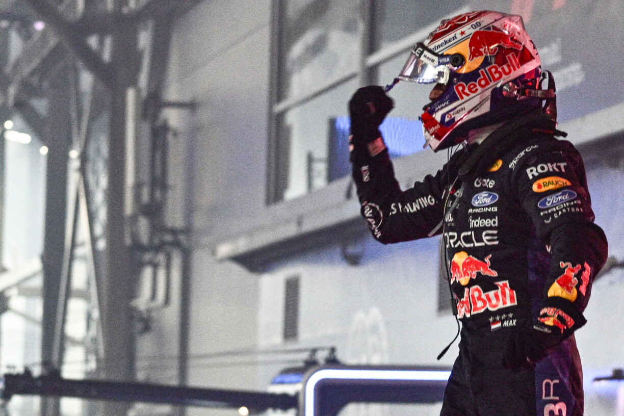 Red Bull Racing's Dutch driver Max Verstappen celebrates winning the Formula One Singapore Grand Prix at the Marina Bay Street Circuit in Singapore on October 11, 2026.