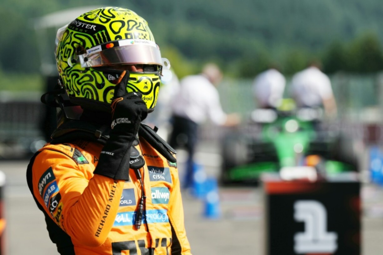 McLaren's British driver Lando Norris celebrates his pole position after the qualifying session ahead of the Formula One Belgian Grand Prix