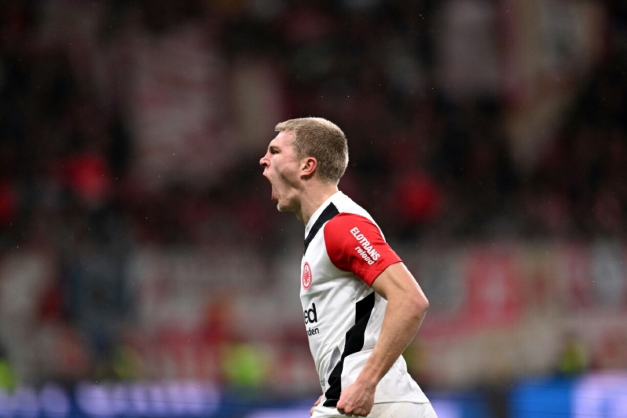 Eintracht Frankfurt's Danish defender Rasmus Kristensen celebrates scoring