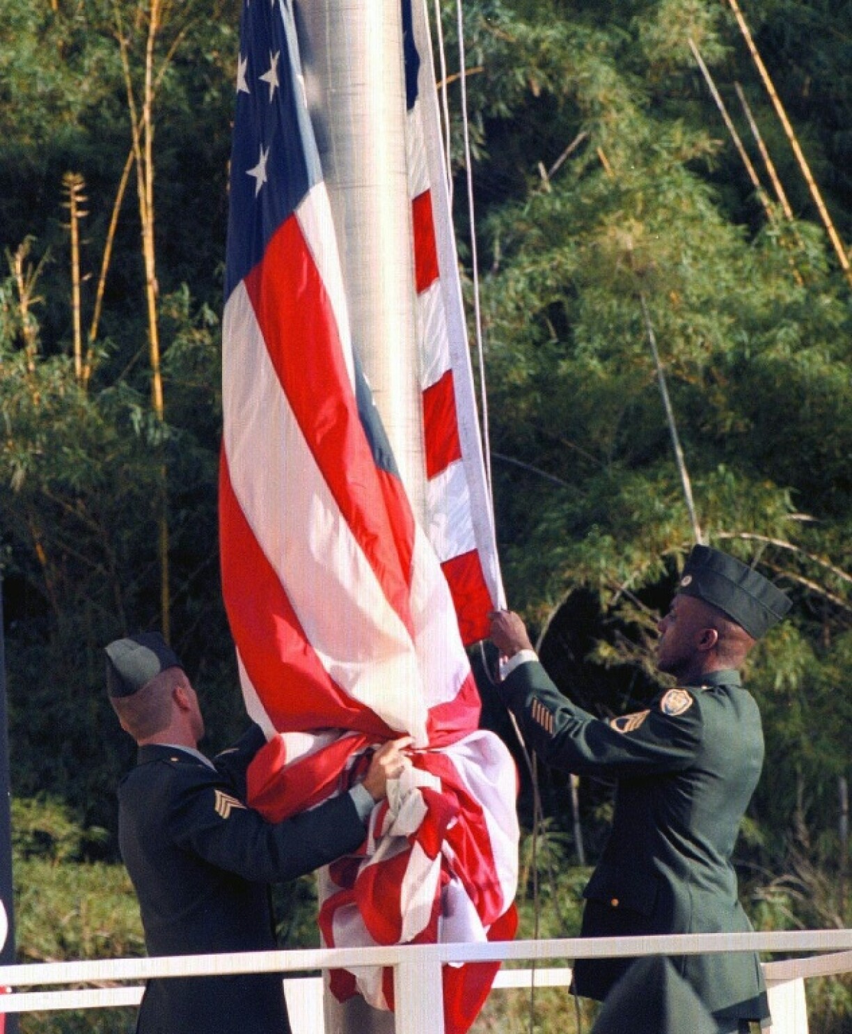 US soldiers lower the US flag for the last time at the Panama Canal Administration building in December 1999