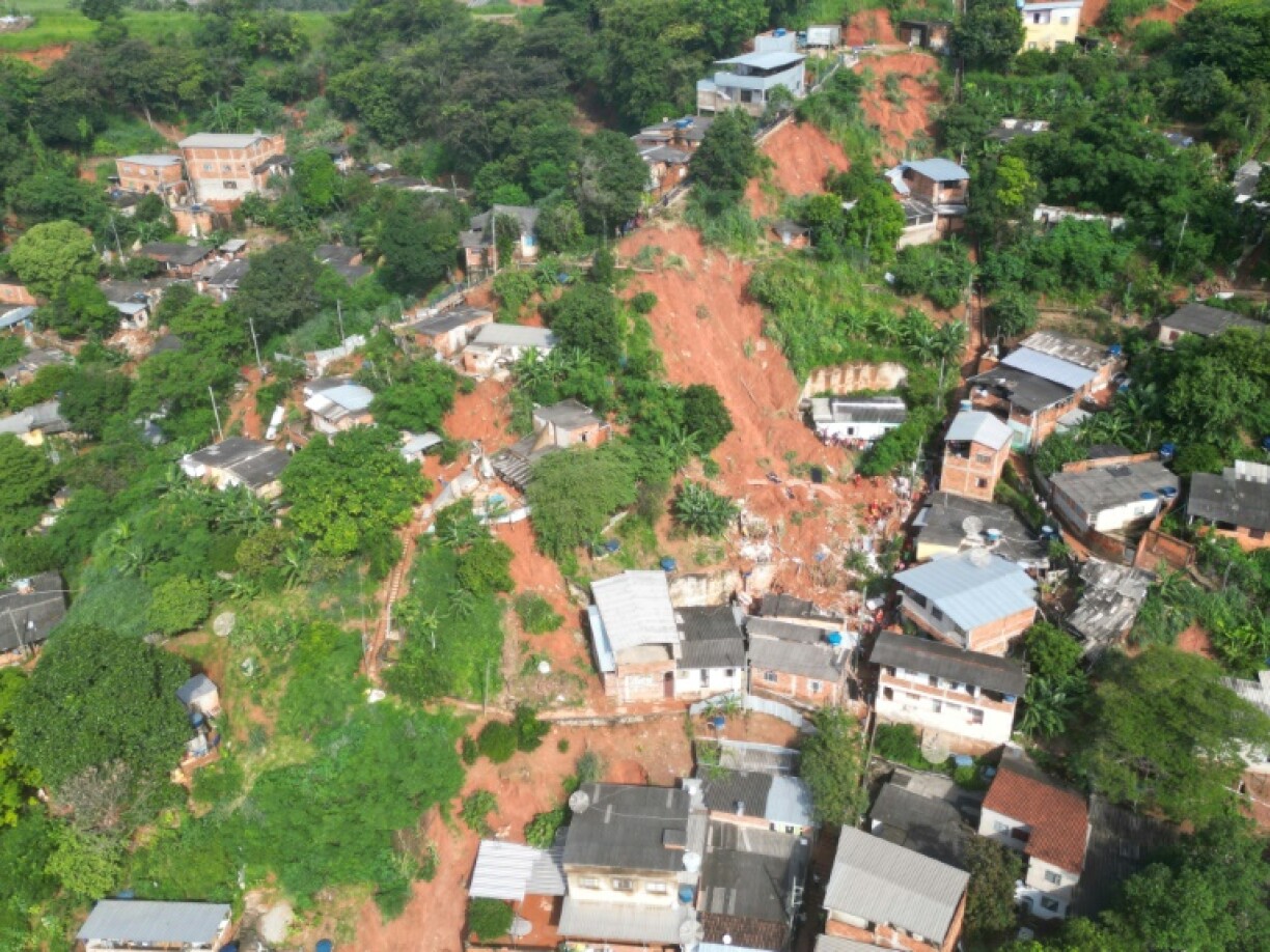 Brazilian rescue teams work on a landslide site in the Bethania neighborhood of Ipatinga, Minas Gerais state, on January 12, 2025
