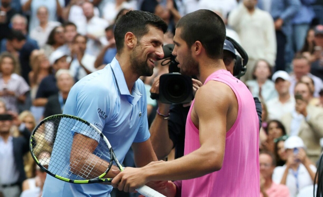 Carlos Alcaraz (R) and Novak Djokovic (L) have been drawn together in the Jimmy Connors Group at the ATP Finals