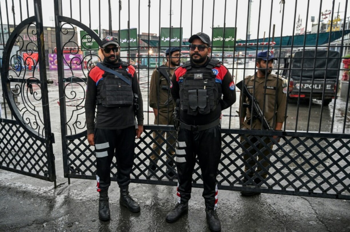 Pakistan security personnel cordon off a street near the Rawalpindi cricket stadium after a drone was reportedly shot down