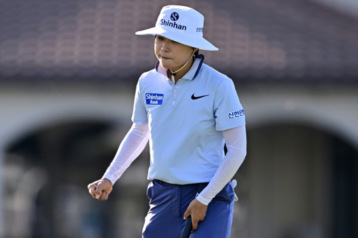South Korea's Lee So-mi reacts after making an eagle putt on the 17th hole to help grab the lead after the opening round of the LPGA Tour Championship