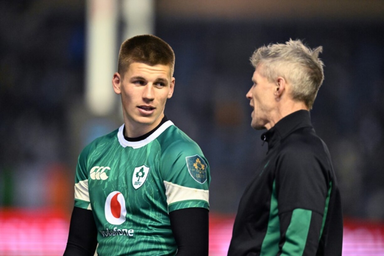 Man of the match Sam Prendergast speaks with Ireland interim coach Simon Easterby after the 32-18 Six Nations win over Scotland at Murrayfield