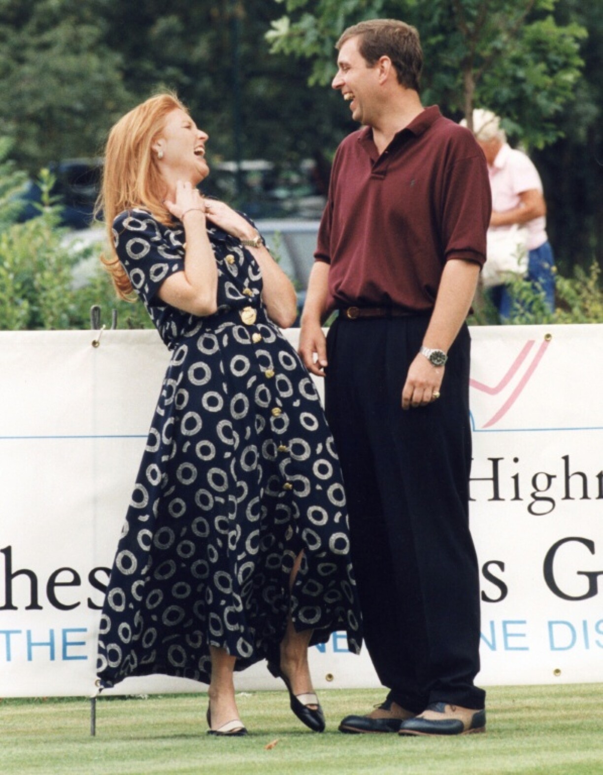 Andrew shares a joke with Sarah Ferguson at an event in 1995