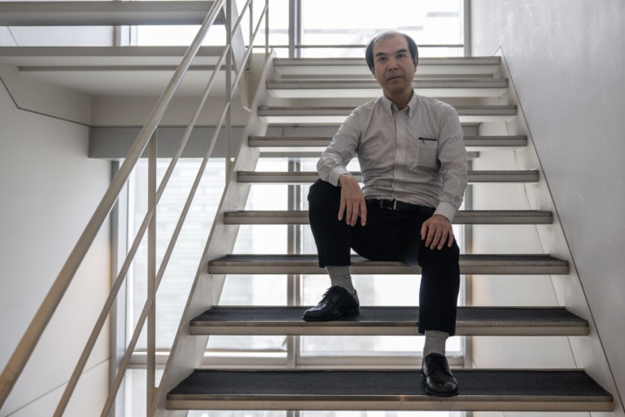 Founder of the website Cryptiana, Satoshi Tomokiyo, poses for a photo in an office building in Tokyo on October 7, 2026