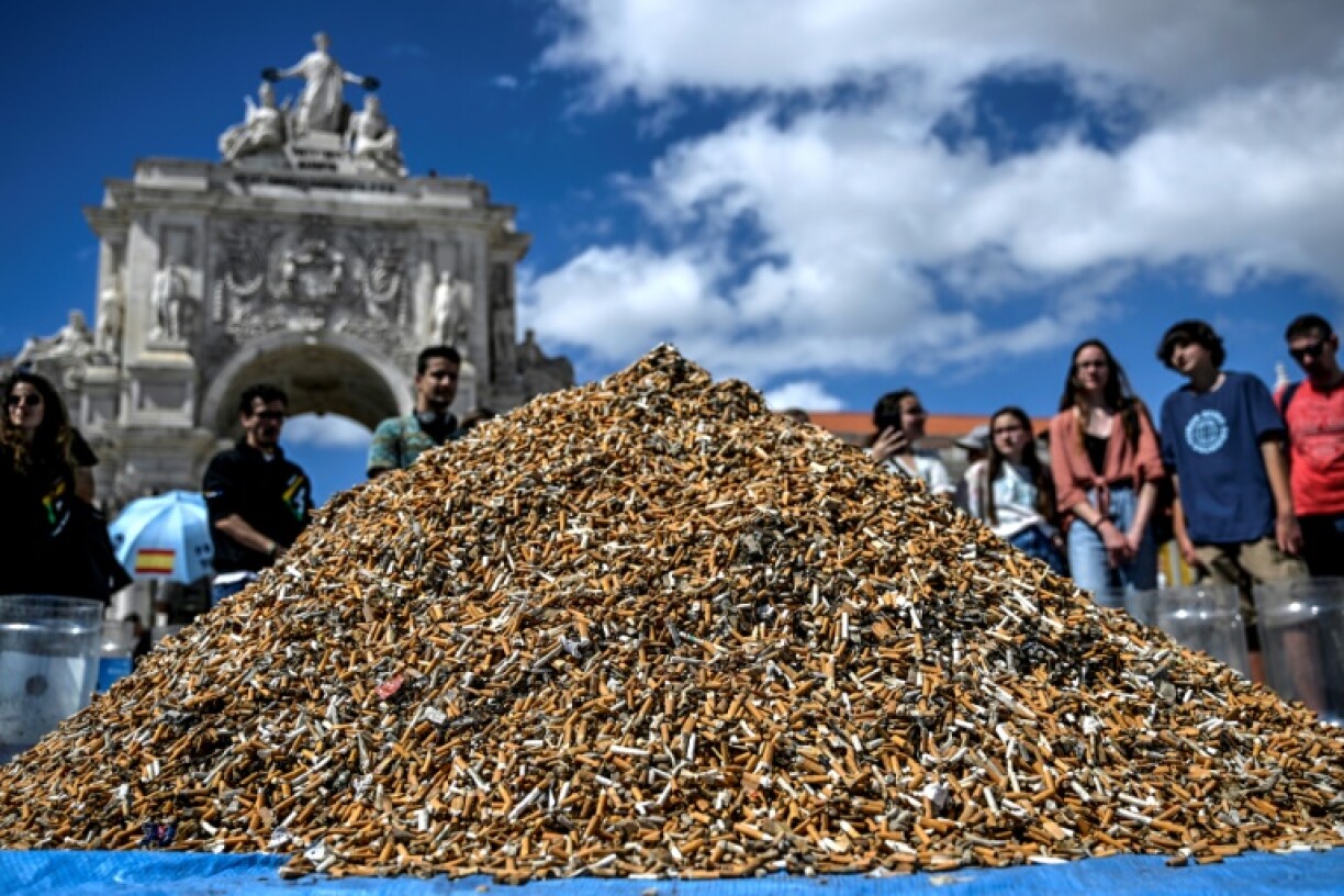A pile of cigarette butts, collected in one week, in a Lisbon square
