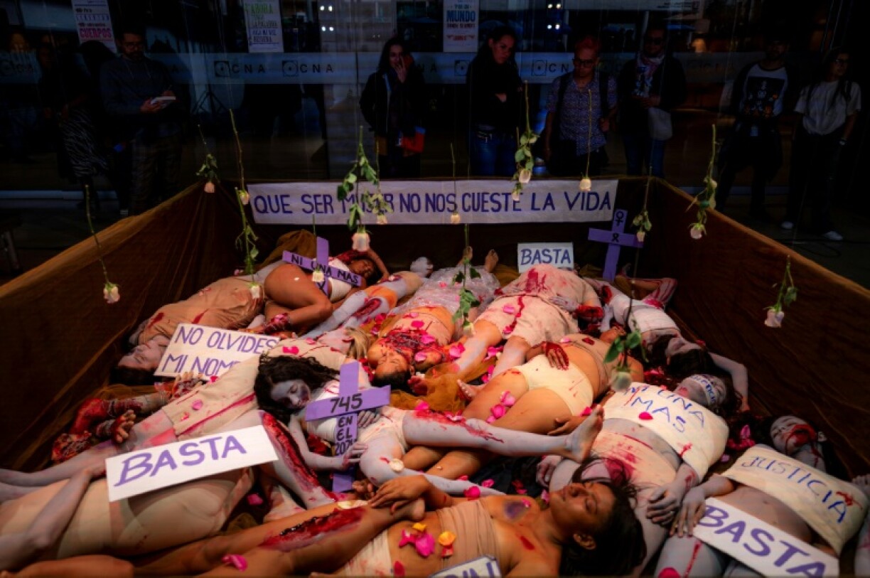 In Bogota, women from the Palma de Vino collective performed an art installation entitled 'Being a woman should not cost us our lives'