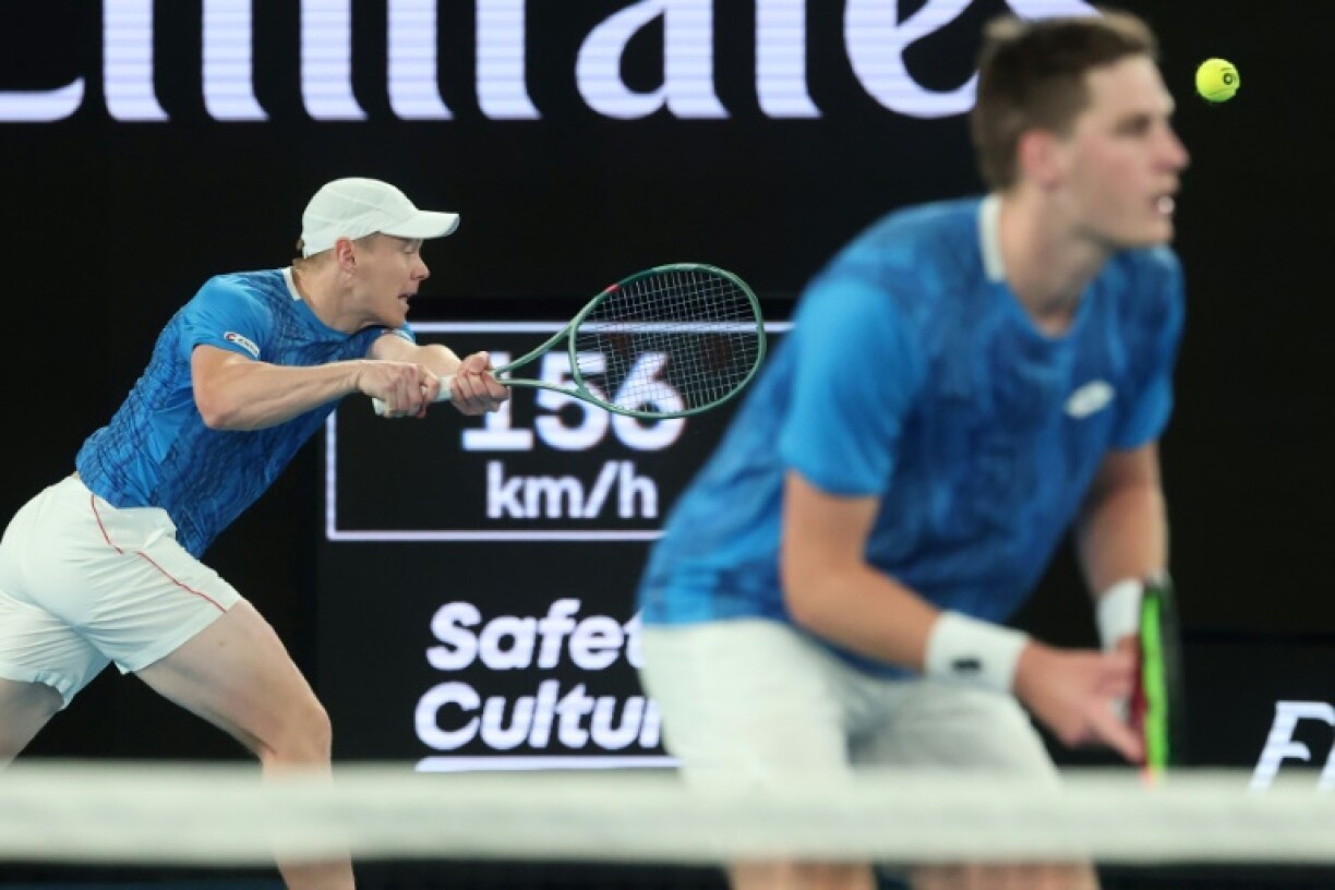 Finland's Harri Heliovaara (L) and Britain's Henry Patten in the final