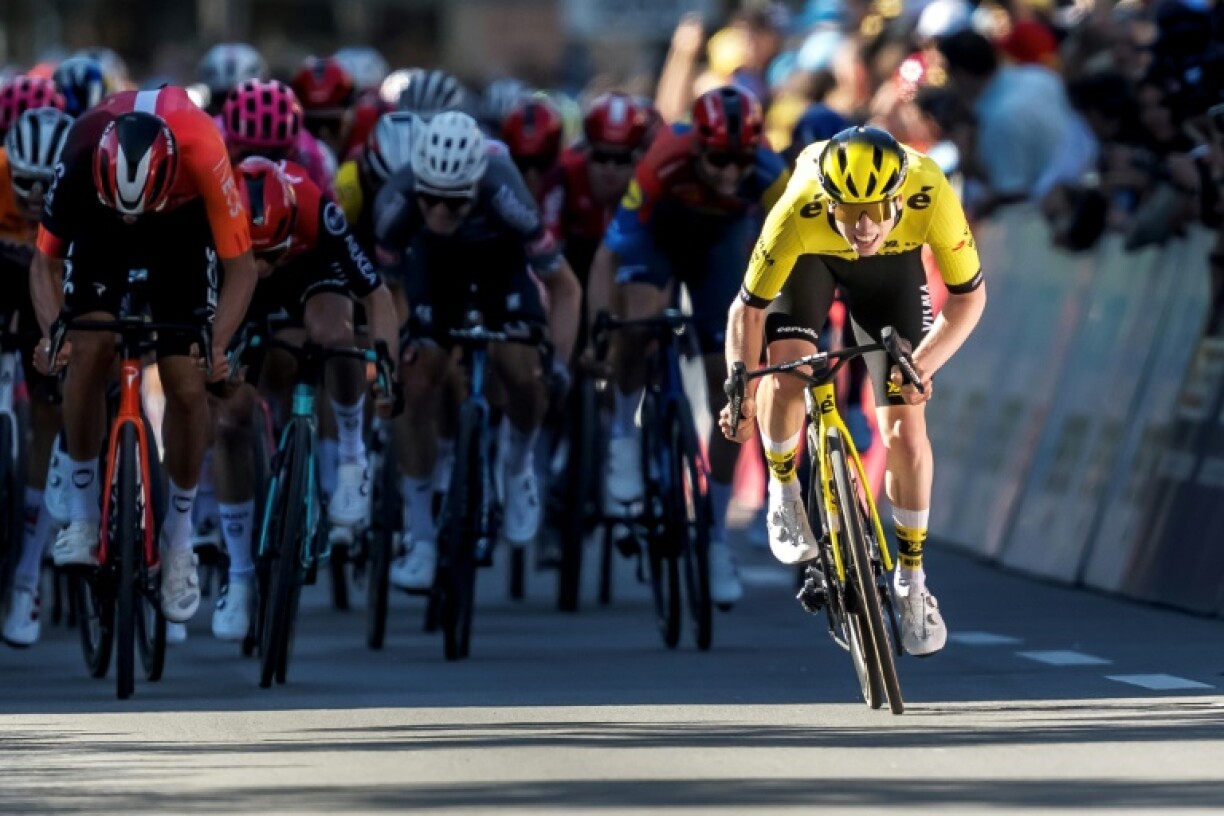James Brennan (Visma) (R) sprints to victory in the first stage of the Tour de Romandie