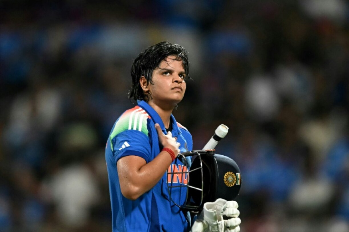 India's Shafali Verma walks back to the pavilion after scoring 87 in the Women's Cricket World Cup final against South Africa