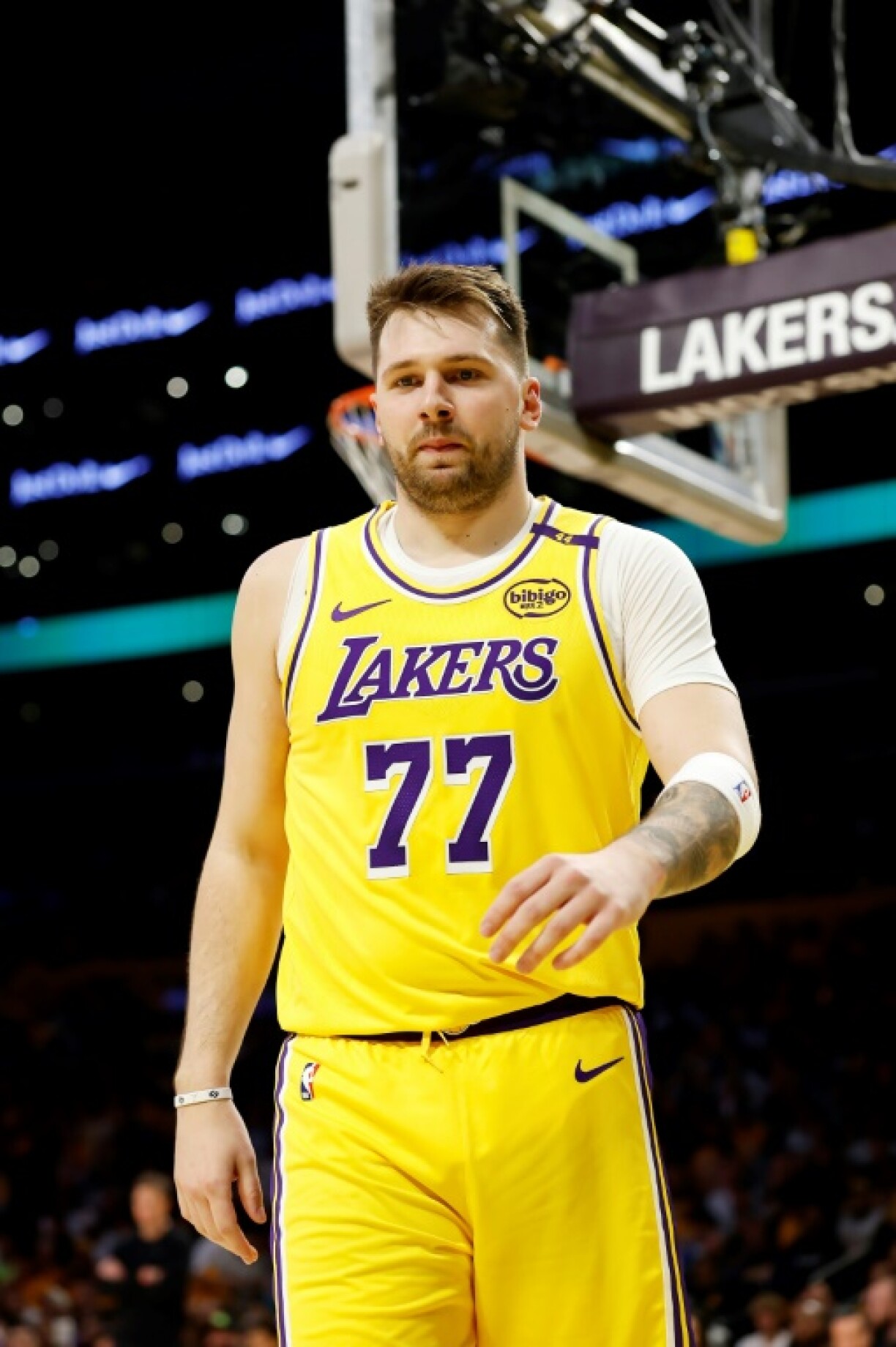 Luka Doncic scored 14 points as his Los Angeles Lakers career began with a crushing win over the Utah Jazz