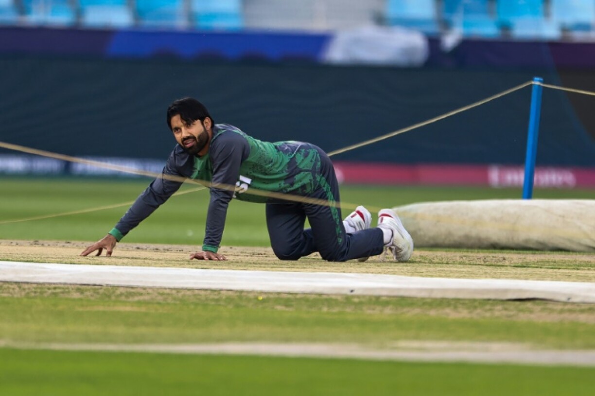 Ground control: Pakistan captain Mohammad Rizwan checks the pitch at the Dubai International Stadium
