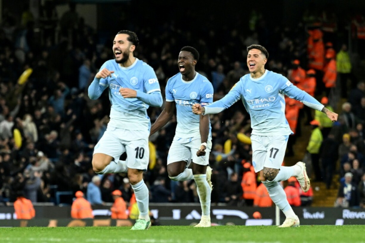 Manchester City celebrate their League Cup win against Brighton