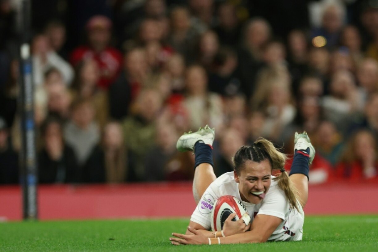 Dive of delight: Maddie Feaunati scores England's first try in their Women's Six Nations win over Wales in Cardiff