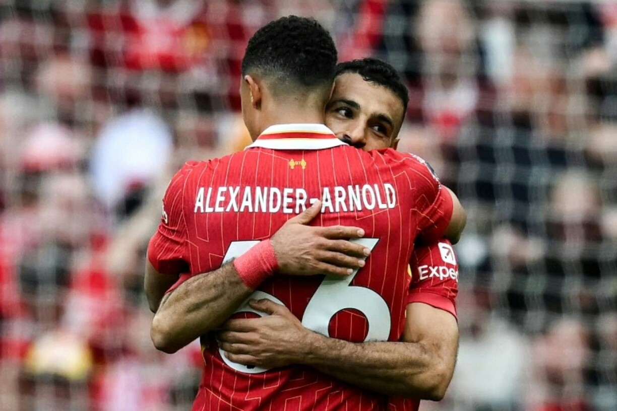 Mohamed Salah (R) celebrates with Trent Alexander-Arnold after equalising for Liverpool against Crystal Palace.