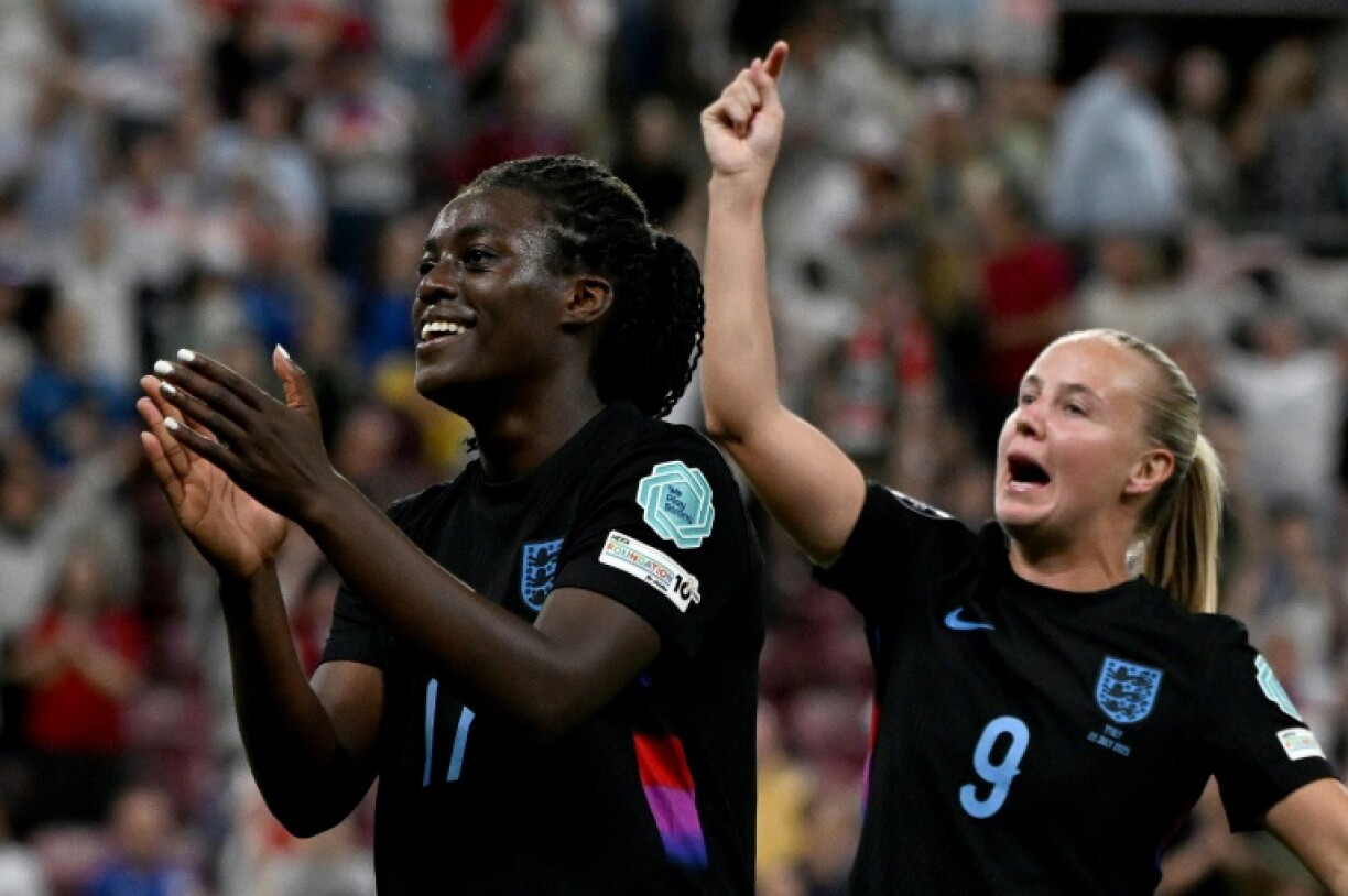 Michelle Agyemang (L) with Beth Mead at the end of England's dramatic win over Italy on Tuesday which took the reigning champions into the final of Euro 2025