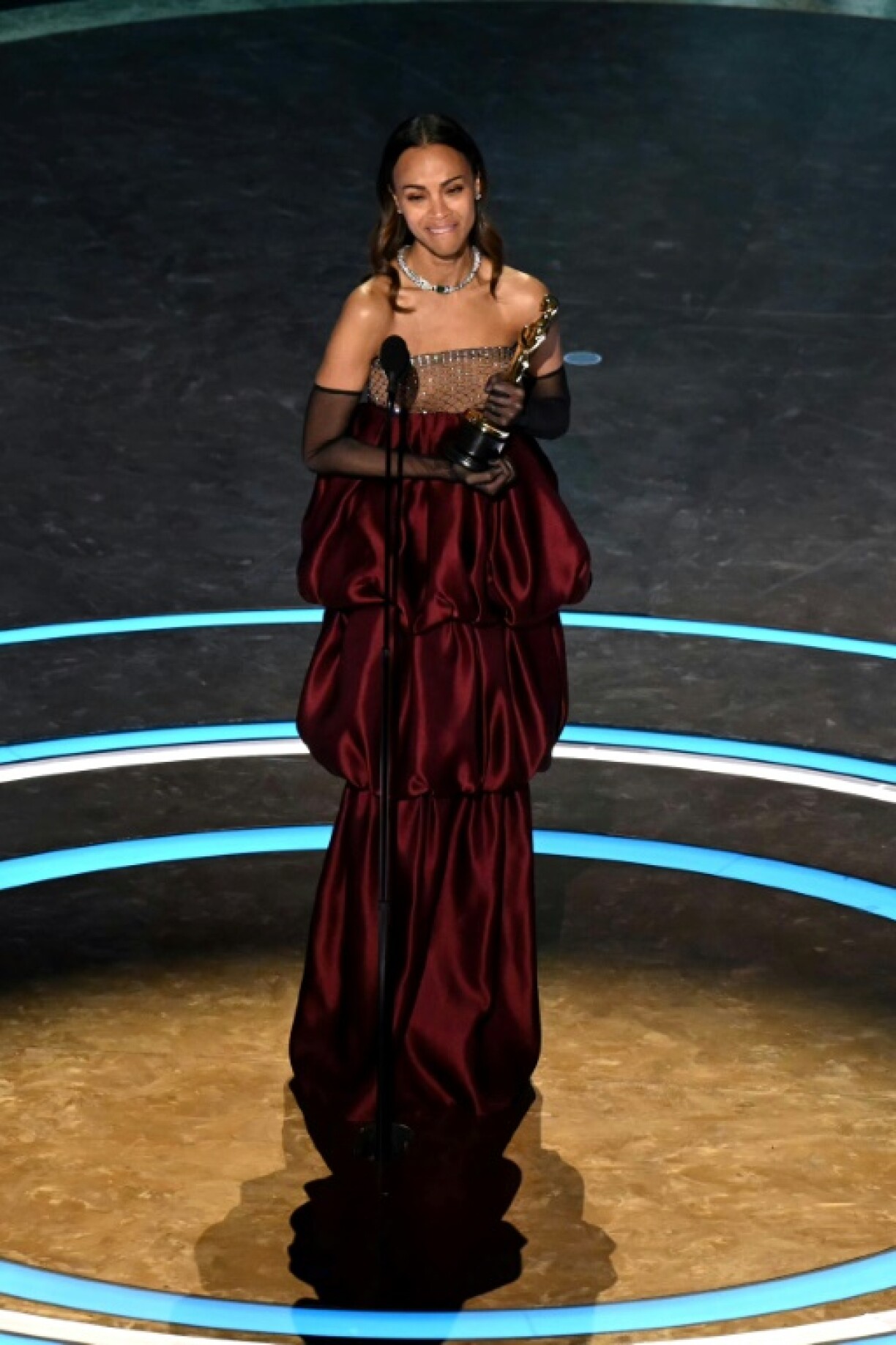 Zoe Saldana wore burgundy Saint Laurent for her Oscar-winning moment