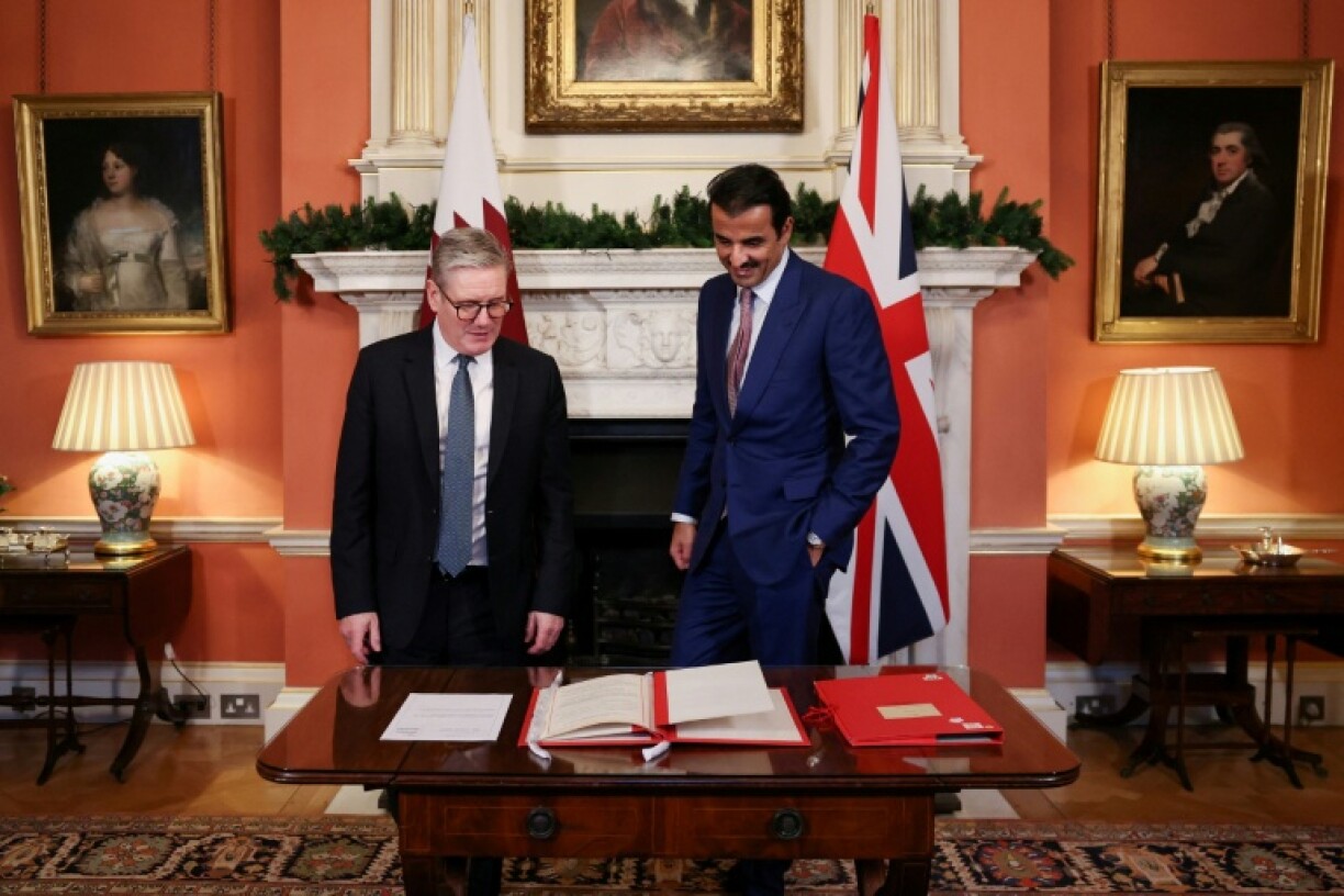 Britain's Prime Minister Keir Starmer (L) hosted Qatar's emir Sheikh Tamim bin Hamad al-Thani (R) in Downing Street