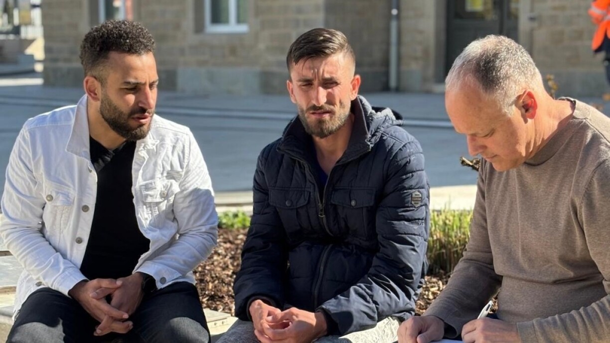 Lokman Mousa (centre) has been in Luxembourg for 20 months