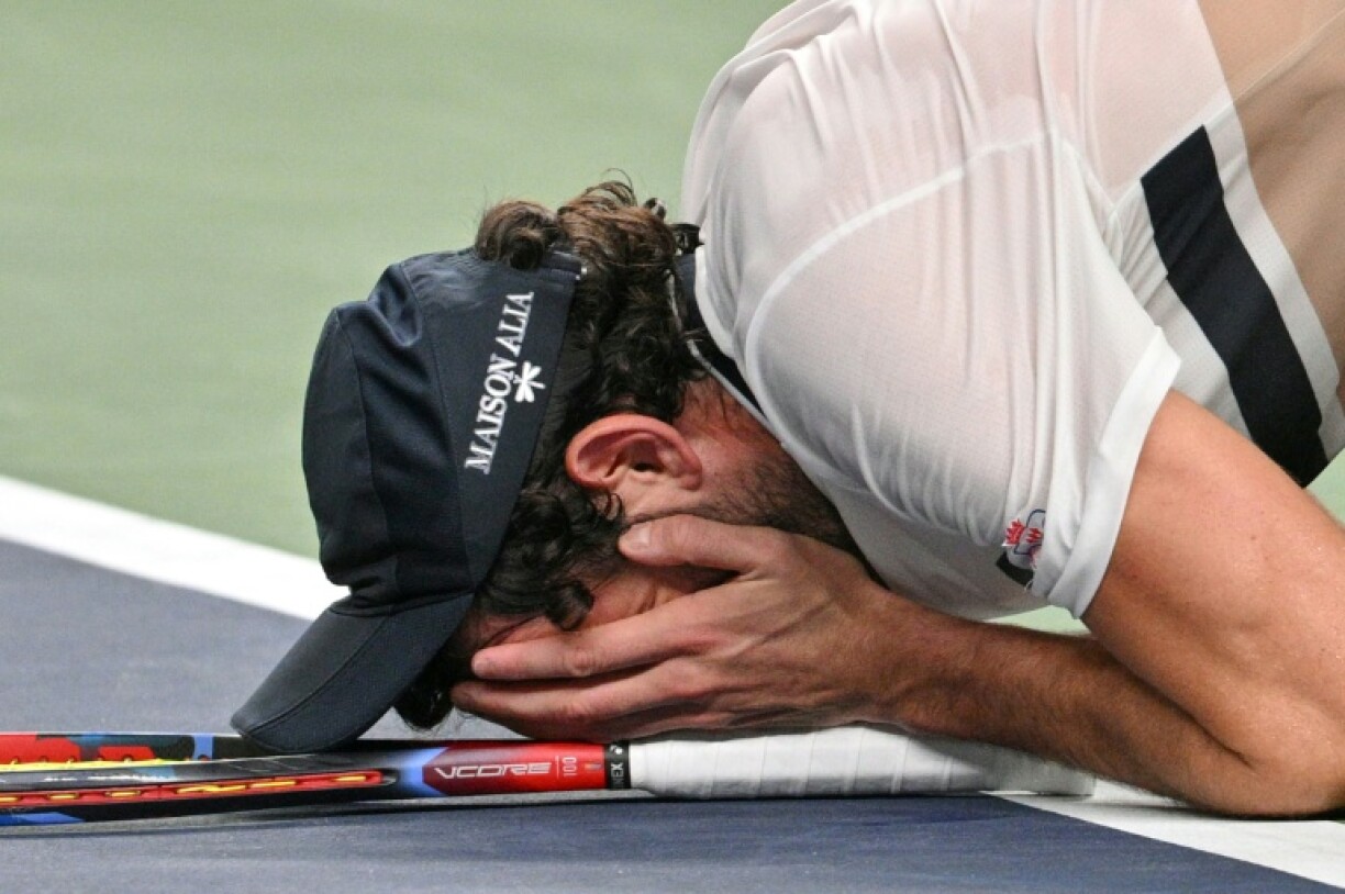 Monaco's Valentin Vacherot celebrates after winning against Denmark's Holger Rune