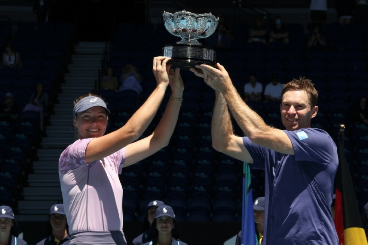Australia's Olivia Gadecki (L) and John Peers won the Australian Open mixed doubles title