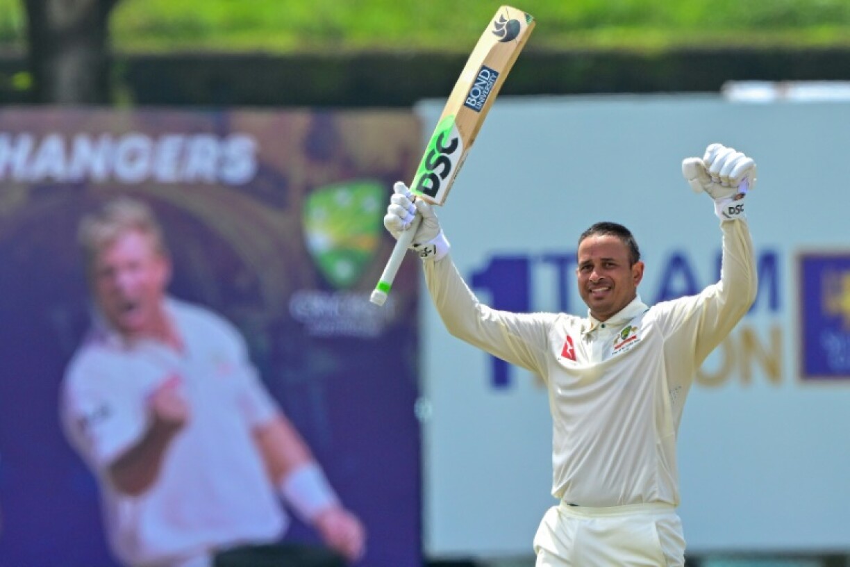 Australia's Usman Khawaja celebrates after scoring a double century (200 runs) at the Galle International Cricket Stadium in Sri Lanka