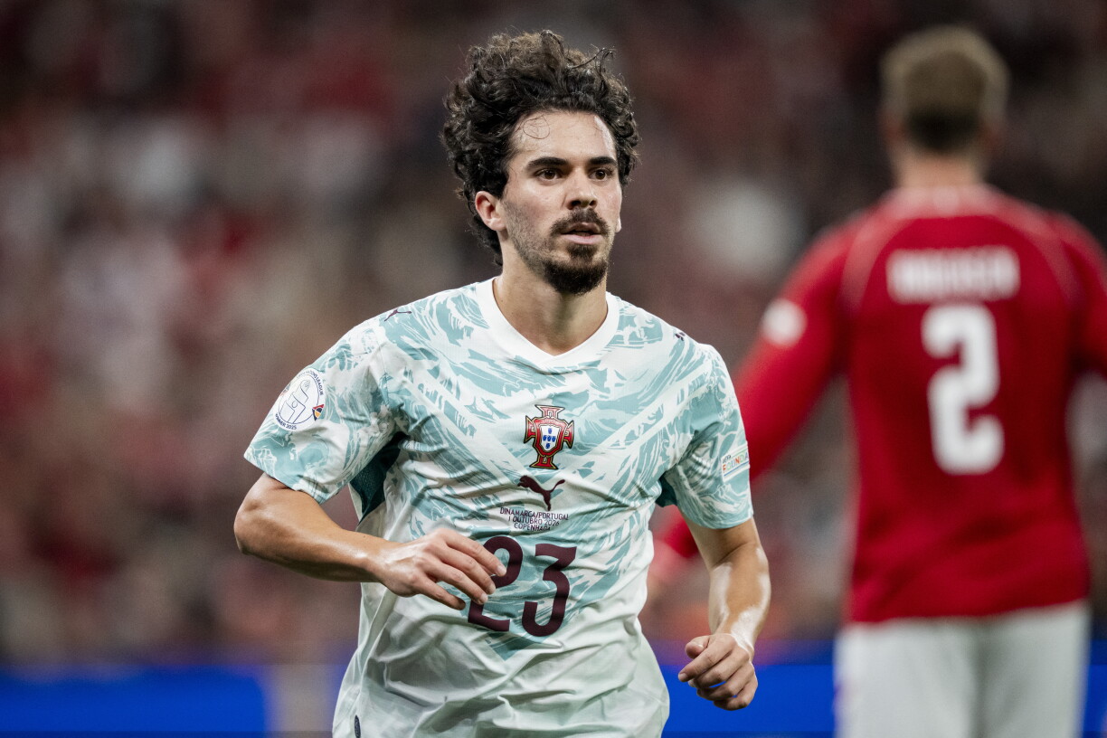Portugal's midfielder #23 Vitinha runs off the ball during the UEFA Nations League Group A4 match between Denmark and Portugal at Parken stadium in Copenhagen on October 1, 2026.